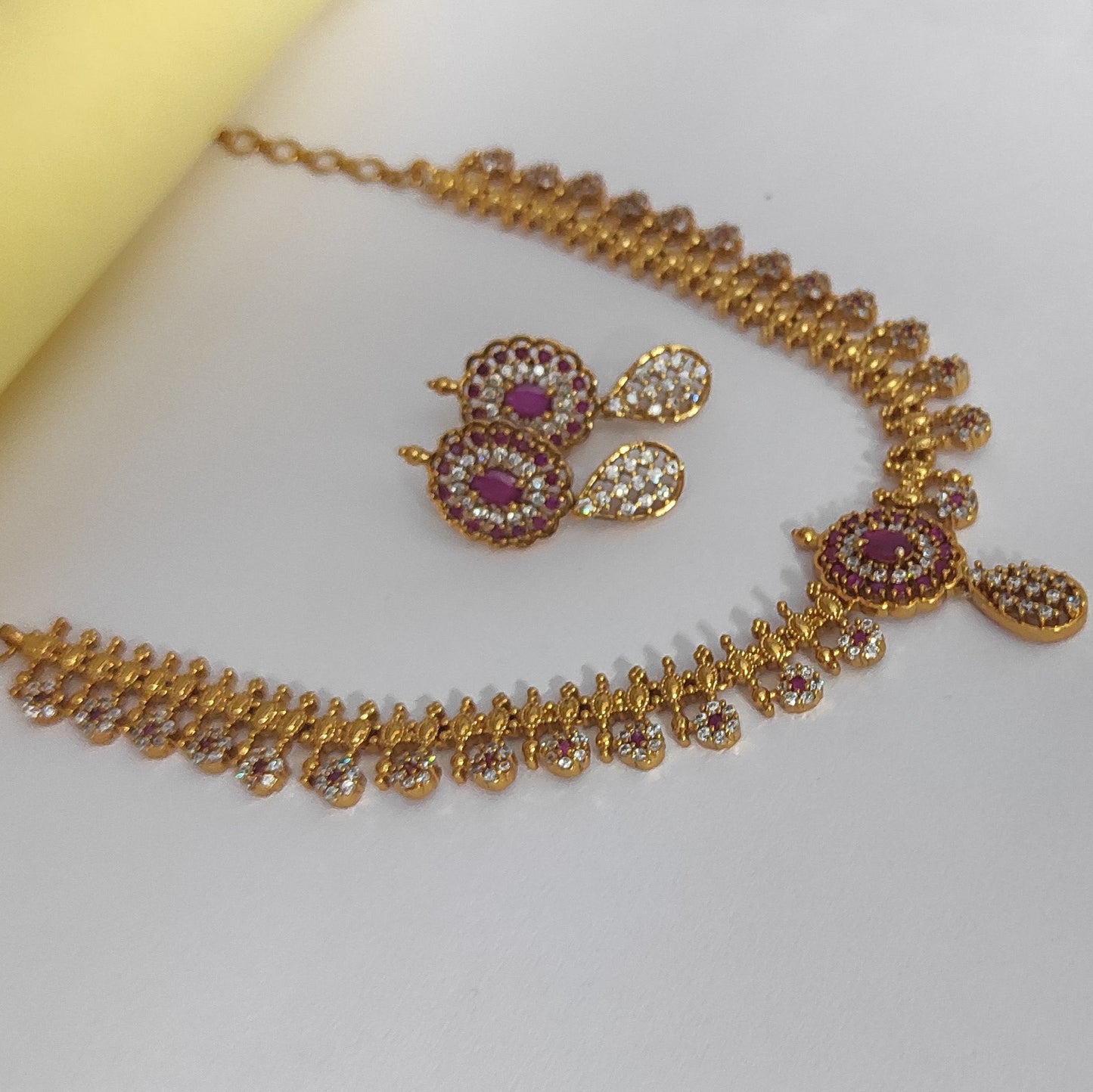 Golden necklace with Ruby pink Rhinestone Jewellery set