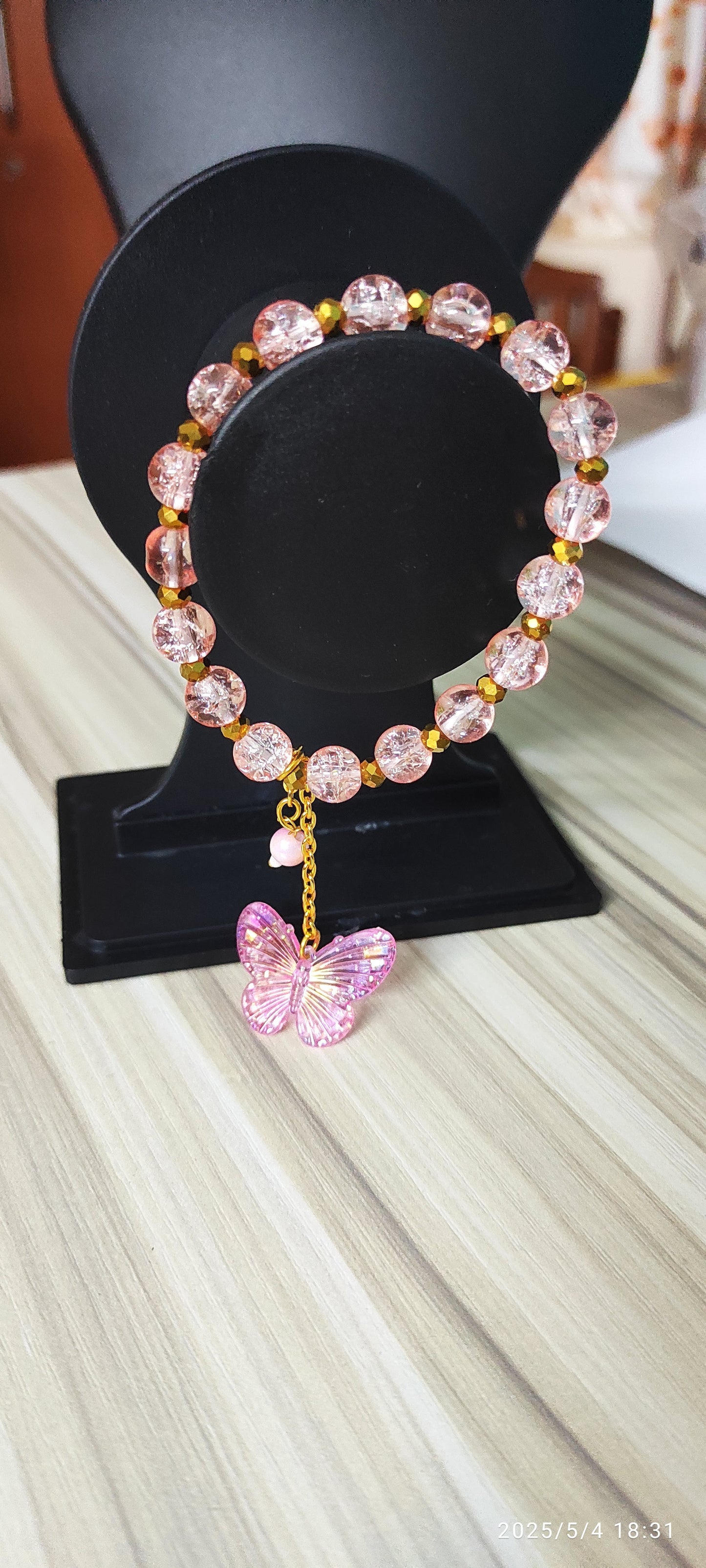 Icy Pink glass beads with butterfly charm designer handmade bracelet.