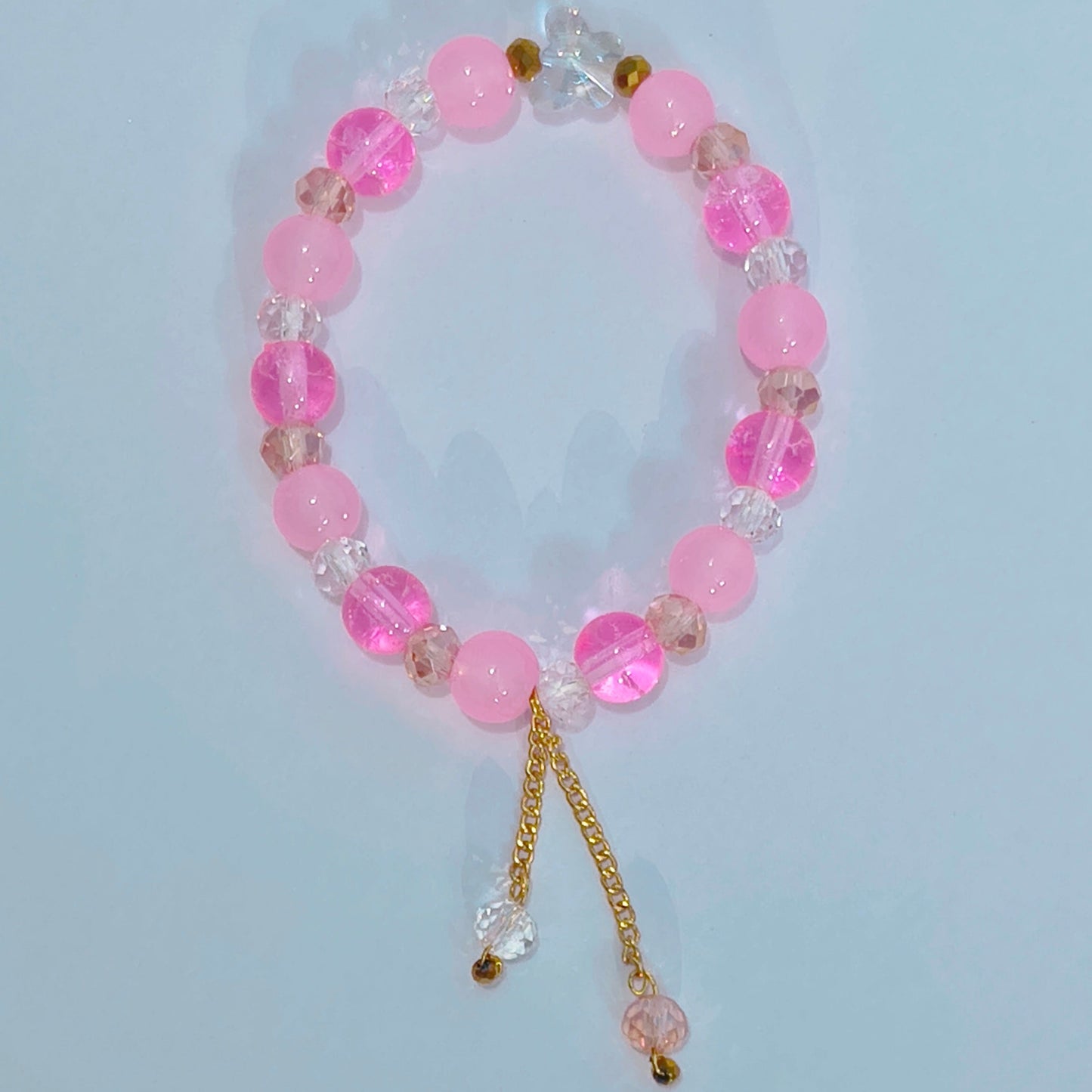 Pink glass beads with butterfly crystal
