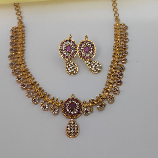 Golden necklace with Ruby pink Rhinestone Jewellery set