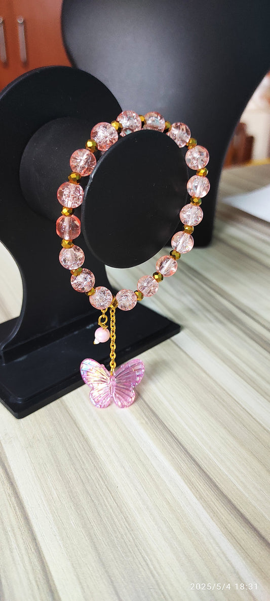 Icy Pink glass beads with butterfly charm designer handmade bracelet.