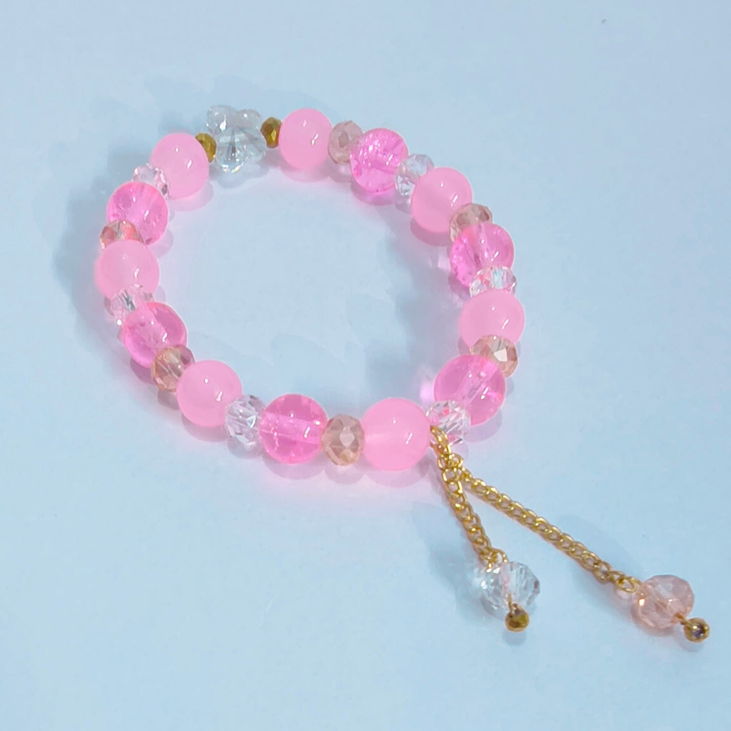 Pink glass beads with butterfly crystal charm